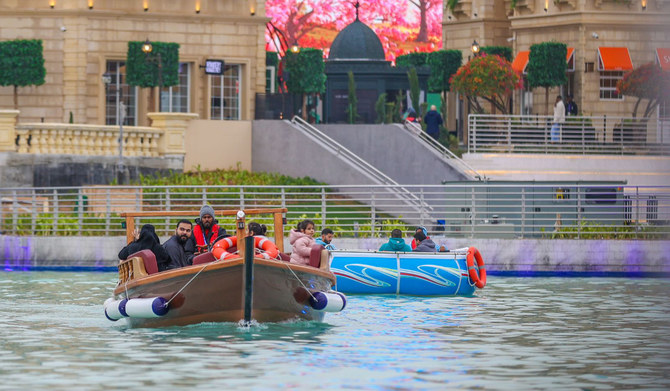 People paddle boating in the artificial lake at Boulevard World in Riyadh - (Credits Arab News)