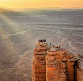 Bask in the Golden Glow of the Sunset at The Edge of the World, Saudi Arabia