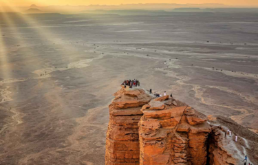 Bask in the Golden Glow of the Sunset at The Edge of the World, Saudi Arabia