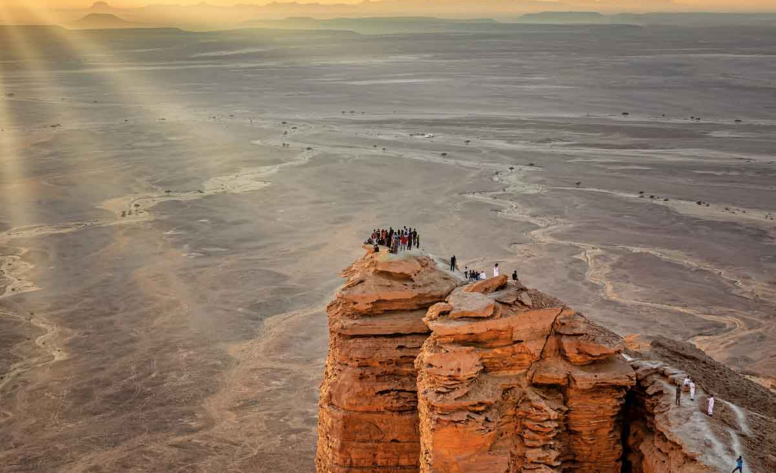 Bask in the Golden Glow of the Sunset at The Edge of the World, Saudi Arabia