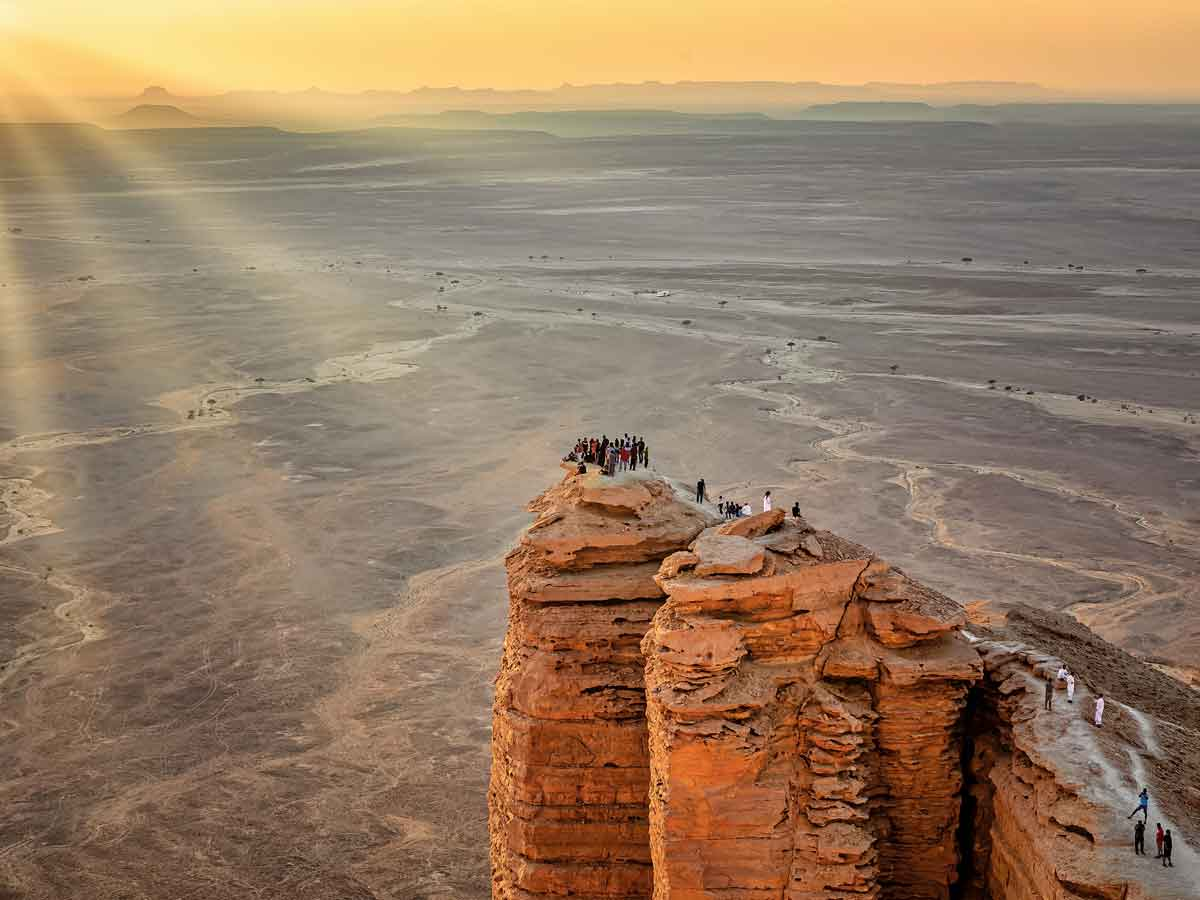 Bask in the Golden Glow of the Sunset at The Edge of the World, Saudi Arabia