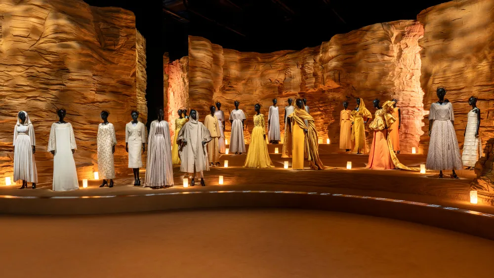 Clothes displayed in the room inspired by AlUla at the Dior Exhibition - (Credits WWD)