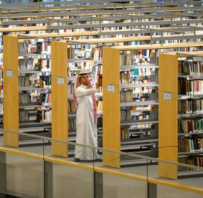 A Saudi man in a library in Riyadh